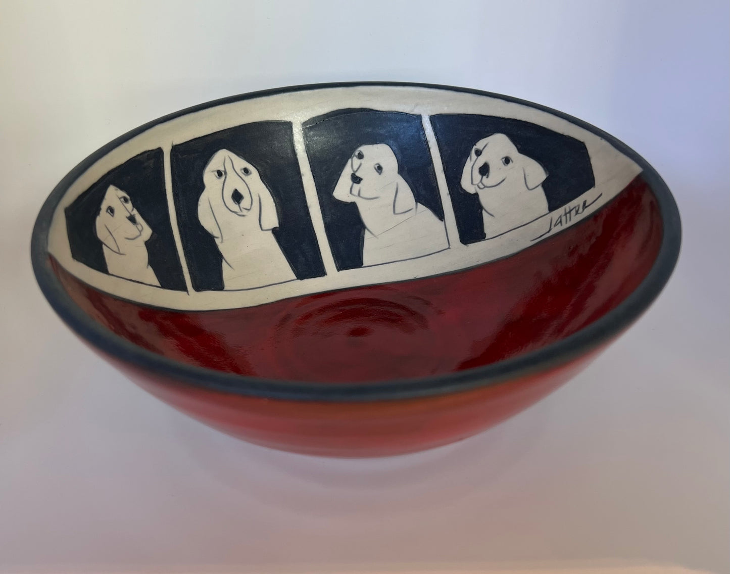 Dogs on Bowl 7.5"x3" by Sally Jaffee